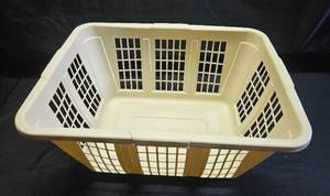 lot 298 image: Plastic Laundry Basket in Cream Color