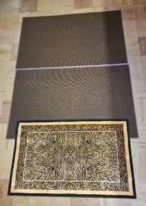 lot 300 image: Set of 2 Area Rugs - Brown Handwoven Mat and Tiger Print Accent Rug