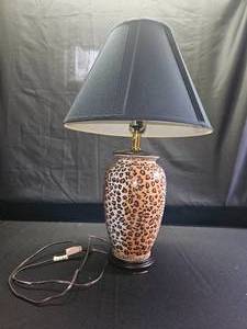 lot 302 image: Vintage Leopard Print Table Lamp with Black Shade