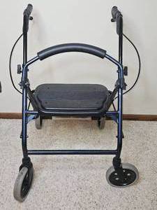 lot 77 image: Lightweight Folding Walker with Seat and Hand Brakes