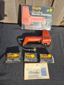 lot 318 image: Vintage Swingline Electric Staplegun with Original Packaging and Staples