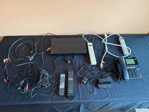 lot 105 image: Complete Insignia Blu-ray Player Bundle with Cables, Remotes, and Accessories