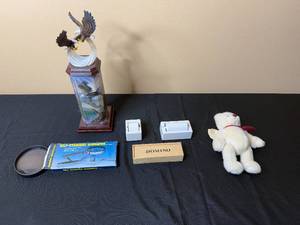 lot 141 image: Mixed Lot Eagle Figurine, Domino Game, Plush Bear, Self-Standing Magnifier, and Ceramic Rollers