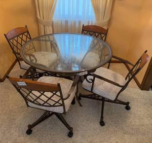 lot 143 image: Round Glass Dining Table with 4 Rolling Chairs
