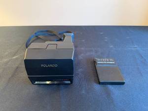 lot 157 image: Polaroid Autofocus 660 Instant Camera with Mura Hi Stepper