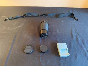 lot 158 image: Canon 35mm Camera Lens with Accessories - 1984 Olympic Games Edition