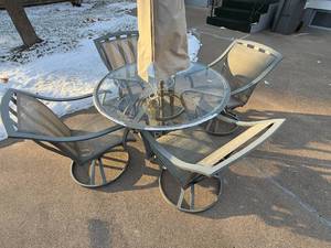 lot 16 image: 5-Piece Outdoor Patio Dining Set with Glass Table and 4 Swivel Chairs