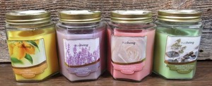 lot 125 image: Lot of 4 trueliving Scented Candles