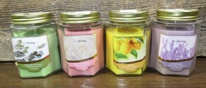lot 126 image: Lot of 4 True Living 7 oz Scented Candles