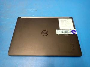 lot 22 image: Dell&nbspLatitude E7470 Laptop &nbspINTEL CORE I7-6600U 2.8 Ghz  8GB DDR4 SDRAM  NO HD  NO OS  14 screen with 1920 x 1080 Resolution  NO Battery &nbspmissing SD port cover,&nbspmajor scratches on palm rest