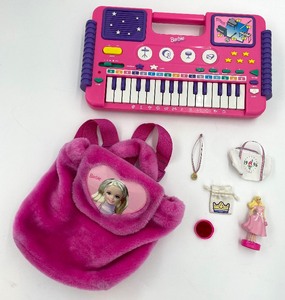 lot 121 image: BARBIE Lot - Hot Pink Plush Backpack, Keyboard, Dollstamp, 1996 Olympic Swag & Bag