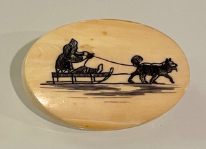 lot 143 image: Vintage Scrimshaw EskimoDog Sled Pin - signed Nuguruk