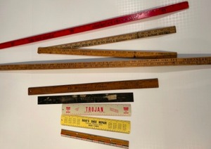 lot 318 image: Antique & Vintage Rulers, Yardsticks Including Minneapolis Tribune, 1937 Hudson Terraplane & More