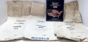 lot 242 image: 3 US Mint Coin Bags & Statehood Commemorative Quarters