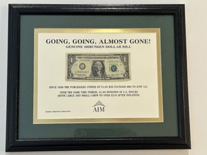 lot 337 image: SHRINKING Dollar Bill Going, Going Almost Gone Genuine Shrunken Dollar Bill AIM Financial Picture