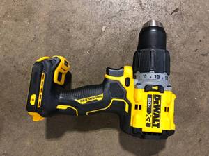 lot 4 image: DEWALT 20V Compact Cordless 12 in. Hammer Drill (Tool Only) Customer Returns See Pictures