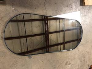 lot 18 image: Timeless Home 30 in. W x 72 in. H x Modern Metal Framed Oval Black Mirror  Customer Returns See Pictures