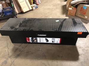lot 26 image: Husky 71.36 in. Matte Black Aluminum Full Size Crossbed Truck Tool Box Customer Returns See Pictures