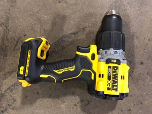 lot 31 image: DEWALT 20V Compact Cordless 12 in. Hammer Drill (Tool Only)    Customer Returns See Pictures