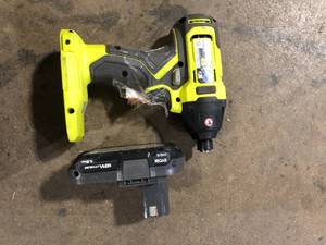 lot 35 image: RYOBI ONE 18V Cordless 14 in. Impact Driver (Tool Only)     Customer Returns See Pictures