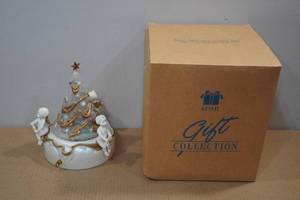 lot 301 image: Avon Gift Collection Wind-Up Holiday Dcor
