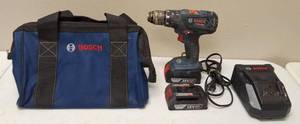 lot 53 image: Bosch Hammer Drill  Driver Kit  (1) Bosch Hammer Drill  Driver (2) Bosch Batteries 18V (1) Bosch 18V Charger (1) Bosch Carrying Bag (Holds Kit)
