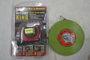 lot 212 image: vintage tape measure and Measure king tape measure