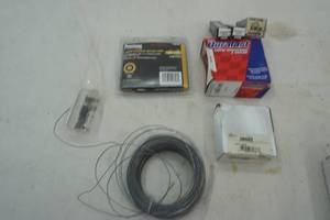 lot 227 image: Auto Lot spark plugs, relay, power steering return hose, solenoid