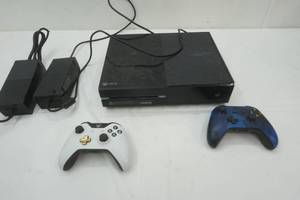 lot 271 image: XBOX ONE console. 2 AC adaptors. 2 controllers