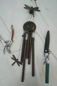 lot 283 image: hedging clippers and wind chime