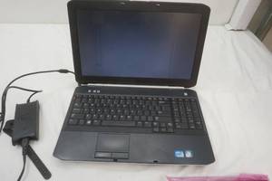 lot 288 image: Dell laptop with extra batter. powered up