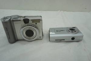 lot 301 image: CannonBell Howell Digital camera lot