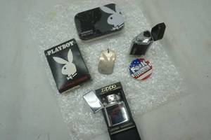 lot 310 image: Playboy lot includes Redwing Zippo Lighter