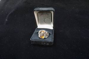 lot 323 image: Jostens LTM class ring