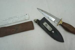 lot 330 image: stainless steel dagger and sheath includes slide rule