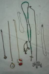 lot 341 image: Jewelry lot, necklaces, Hello Kitty, watch necklace and other