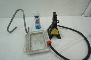 lot 377 image: 2 14 ton jack and other tools, hanging rack and glass cleaner