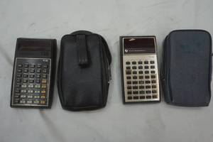 lot 464 image: Vintage scientific calculator with cases