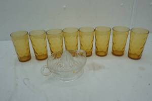 lot 57 image: Collectible gold glasses and lemon squeezer