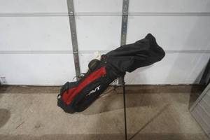 lot 594 image: Golf club bag , clubs