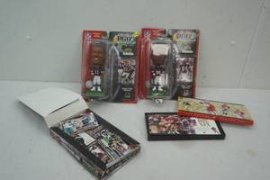 lot 29 image: NFL bobbleheads and football and other collector cards