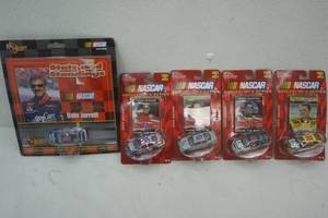 lot 34 image: Nascar collectors series die cast cars and Dale Jarrett car