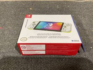 lot 159 image: Split Pad Compact (Light Gray & Yellow ) for Nintendo Switch