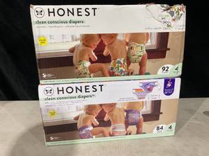 lot 381 image: LOT OF 2 Honest Conscious Diapers Size 4