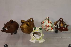 Vintage CollectionFour Pig Piggy Banks and a Frog