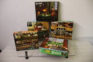 (5) Charles Wyzockis Americana 1000-Piece Jigsaw Puzzles