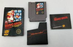 1985 NES (5 Screw)  Super Mario Bros. (Unpunched Hangtab) Complete With Sleeve And Manual