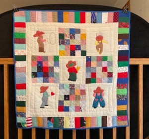 lot 9 image: Quilted Wall ArtHand-Stitched Vintage Square Quilt For the Love of the Rodeo  Cowboy Kids Finished Lap Quilt in Various Colors and Patterns