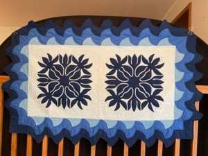 lot 11 image: Quilted Wall BedCover ArtHand-Stitched Vintage Quilt Abstract Blues Wall Hanging wHoops By M. Ruskamp 1981