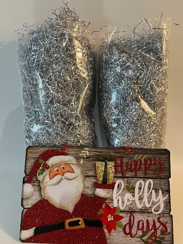 Extra Large Bags of Tinsel and Happy Holly Days Sign